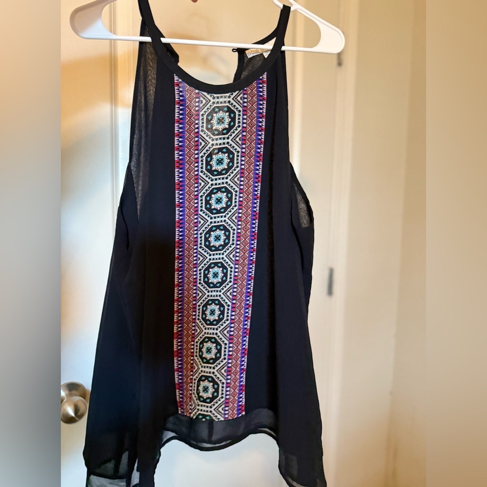 Black Sleeveless Top with Geometric Pattern